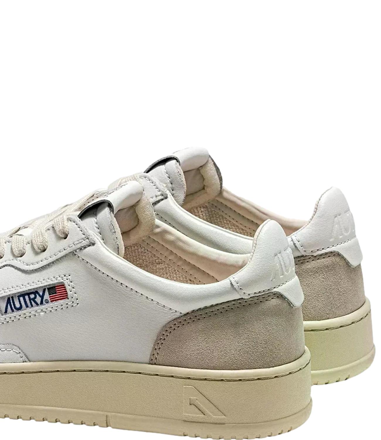 Sneaker Autry bianca e beige con inserti in suede uomo