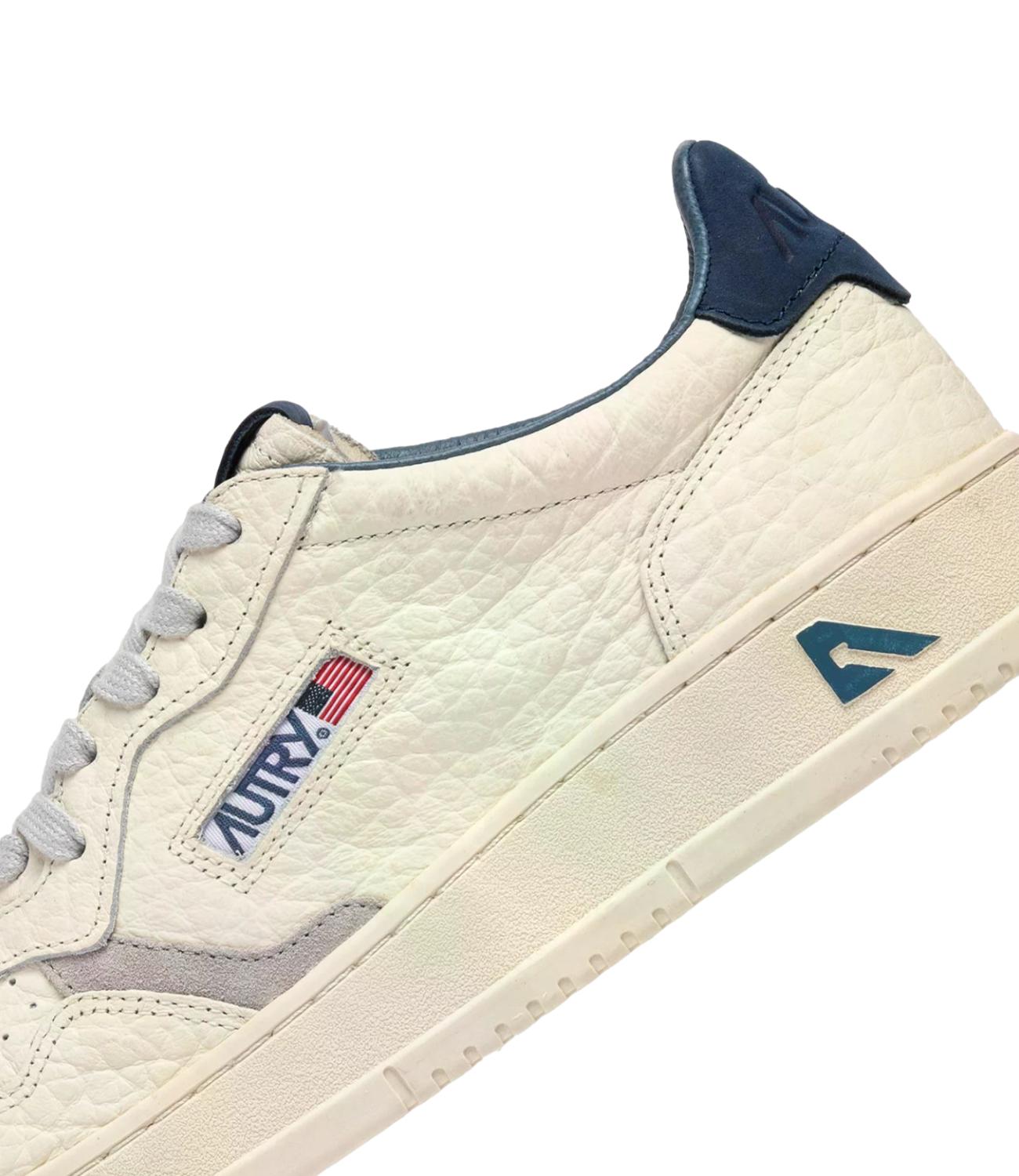 Sneaker Autry bianca in pelle martellata con dettagli blu Uomo