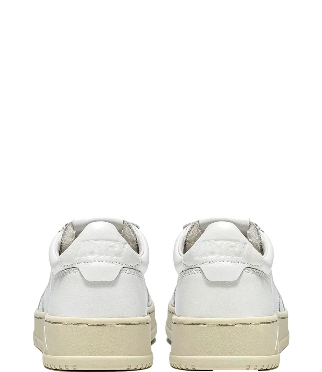 Sneaker Autry bianca in pelle con suola color crema Donna
