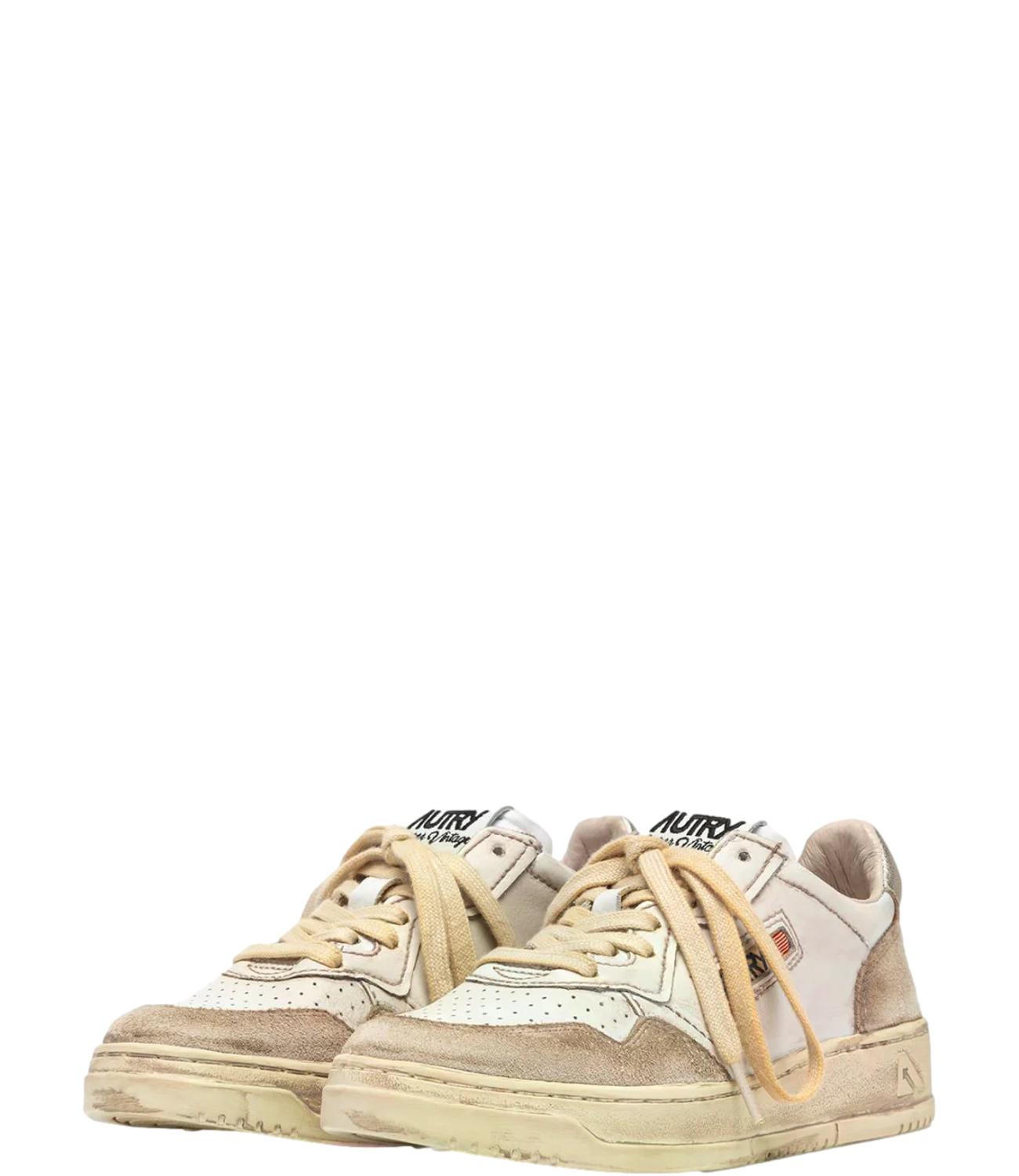 Sneaker Autry bianca e beige con dettaglio champagne Donna