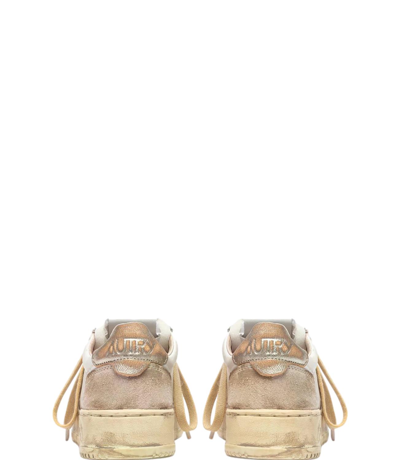 Sneaker Autry bianca e beige con dettaglio champagne Donna