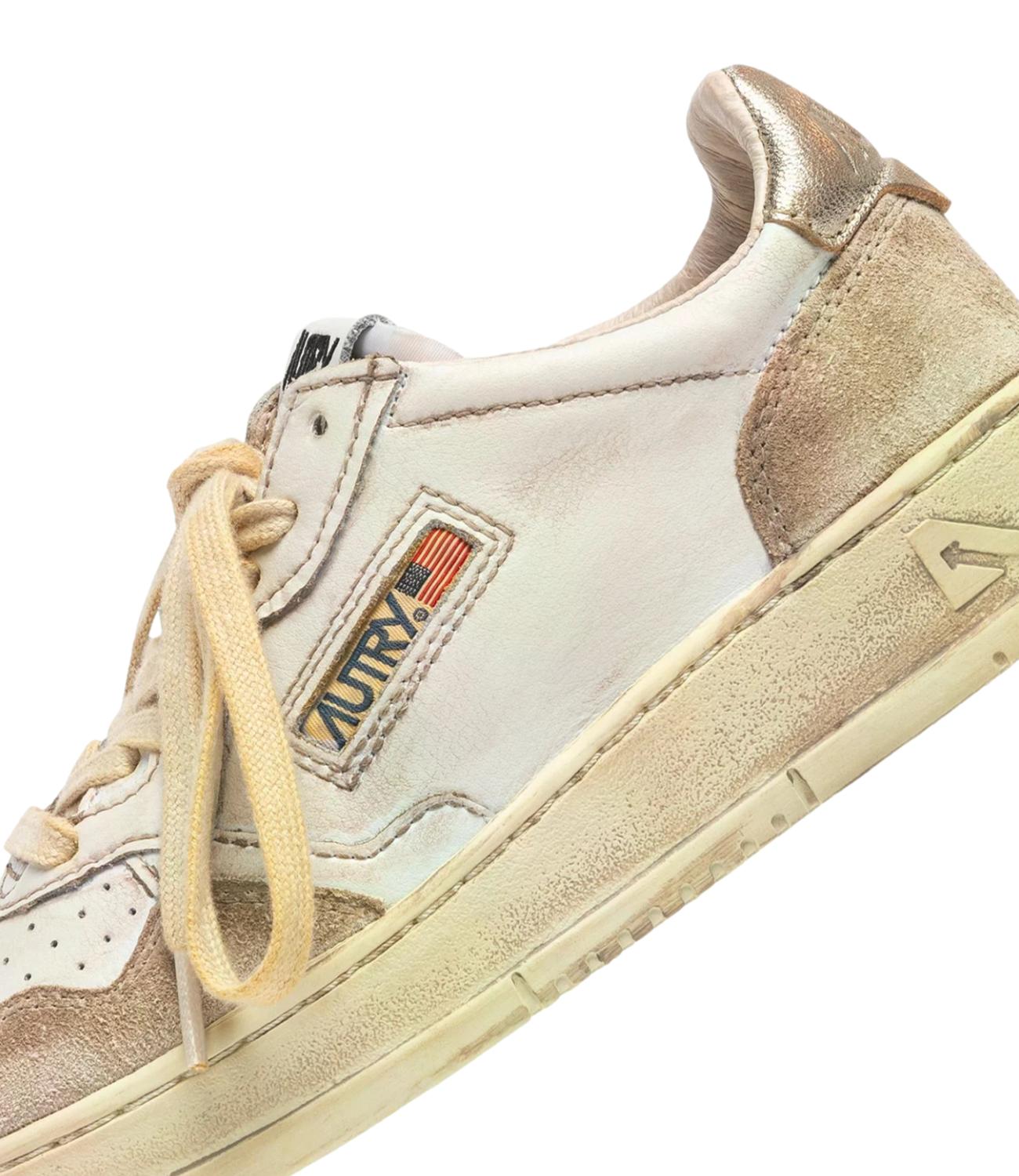 Sneaker Autry bianca e beige con dettaglio champagne Donna