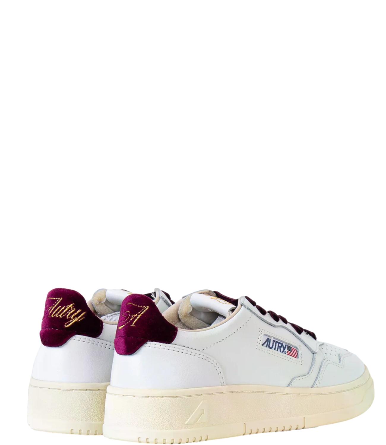 Sneaker Autry bianca in pelle con dettagli bordeaux
