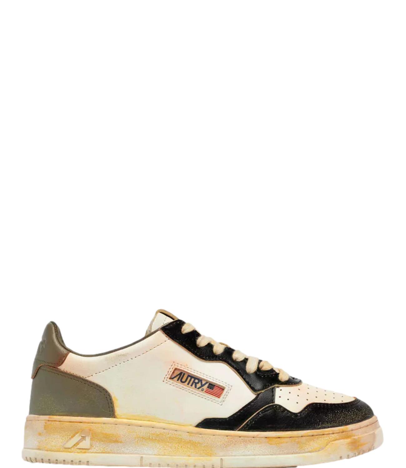 Sneaker Autry bianca e nera con effetto vintage