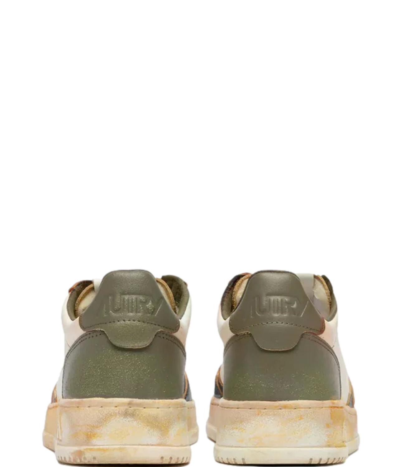 Sneaker Autry bianca e nera con effetto vintage