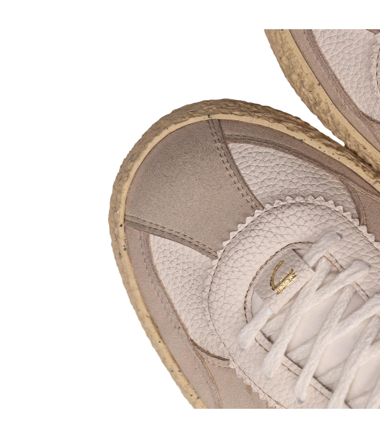 Sneakers Puraai bianca e nera Vintage Osso